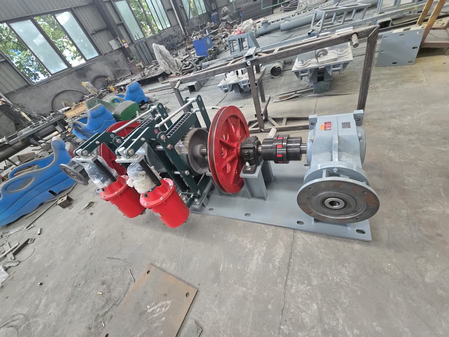 Recovery winch with red drum and electric motor